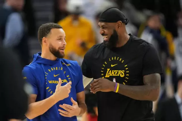 nba christmas day a two basketball player talking to each other